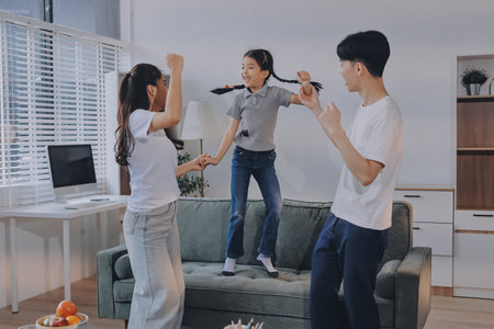 Family spends their free time togetherの写真素材