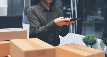 Portrait of Starting small businesses SME owners, two Asian woman check online orders Selling...