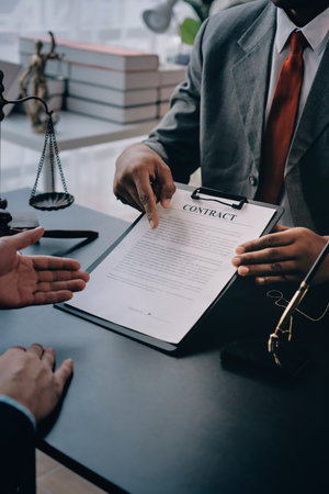 Lawyer explained to the client about the law that must be brought against the court case.