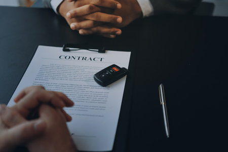 Car salesman gave the keys to the customers who signed the purchase contract legally, Successful...