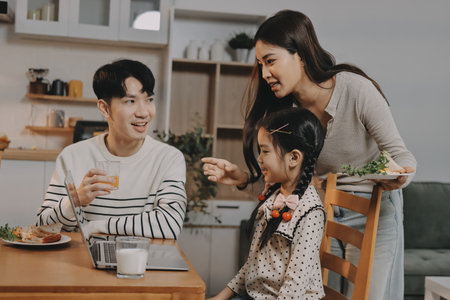 Family spends their free time togetherの写真素材