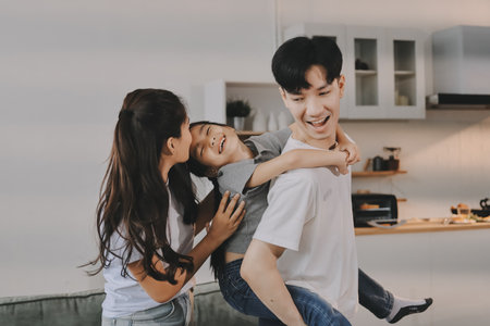 Family spends their free time togetherの写真素材