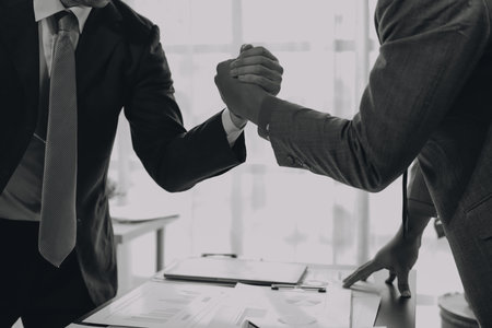 Business handshake for teamwork of business merger and acquisition,successful negotiate,hand...