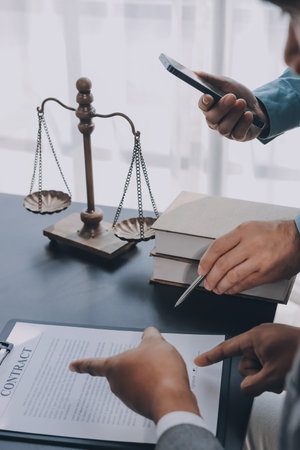 Lawyer explained to the client about the law that must be brought against the court case.