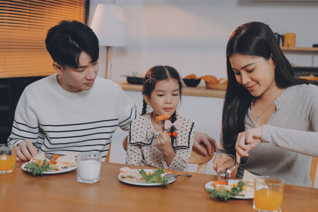 Family spends their free time togetherの写真素材