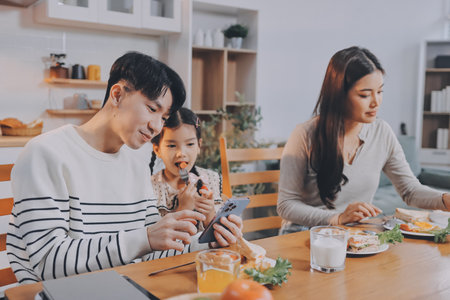 Family spends their free time togetherの写真素材