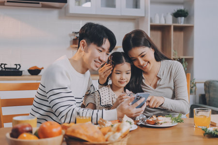 Family spends their free time togetherの写真素材