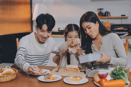 Family spends their free time togetherの写真素材