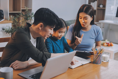 Family spends their free time togetherの写真素材