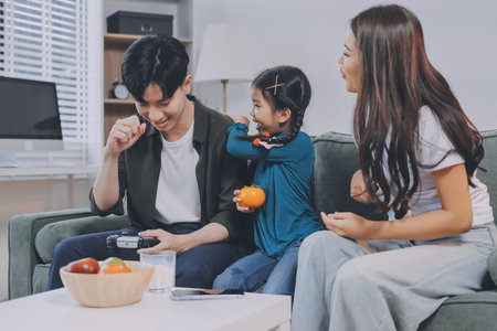 Family spends their free time togetherの写真素材