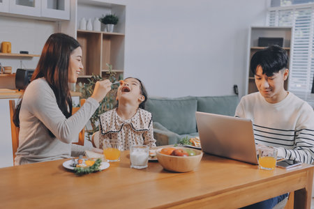 Family spends their free time togetherの写真素材