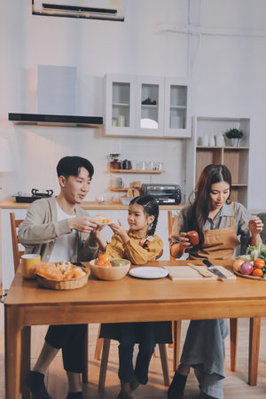 Family spends their free time togetherの写真素材