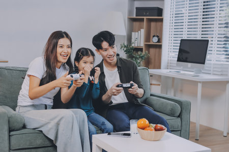 Family spends their free time togetherの写真素材