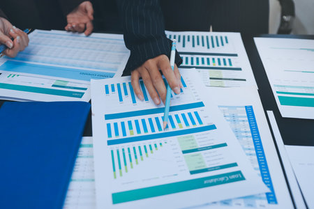 Success, audience with an applause and in a business meeting at work with a lens flare together. Achievement or celebration, motivation and businesspeople clapping hands for good news or supportの写真素材