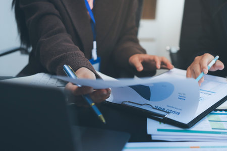 Success, audience with an applause and in a business meeting at work with a lens flare together. Achievement or celebration, motivation and businesspeople clapping hands for good news or supportの写真素材