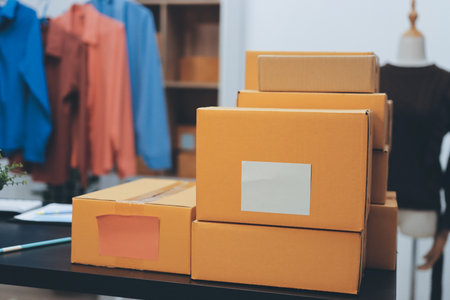 Portrait of Starting small businesses SME owners, two Asian woman check online orders Selling...
