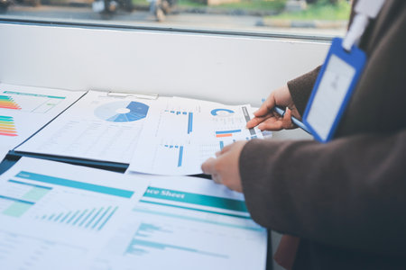 Success in a business meeting at work with a lens flare. Achievement or celebration, motivation and businesspeople clapping hands for good news or supportの写真素材