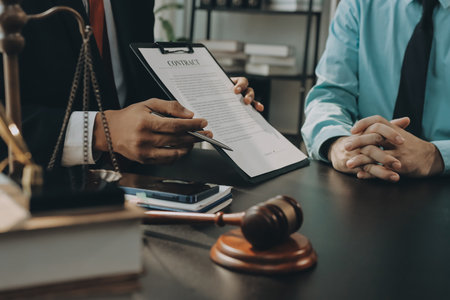 Lawyer explained to the client about the law that must be brought against the court case.の写真素材