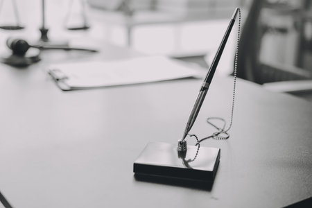 Lawyer explained to the client about the law that must be brought against the court case.の写真素材