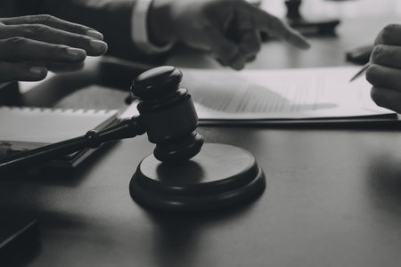 Lawyer explained to the client about the law that must be brought against the court case.の写真素材