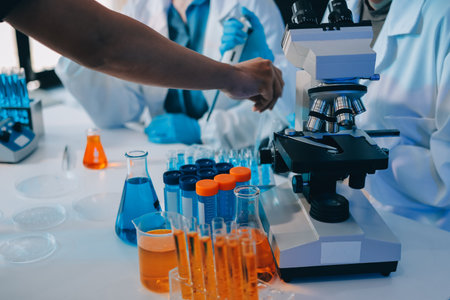 Collaboration, tablet or science with people in lab together for research or development....