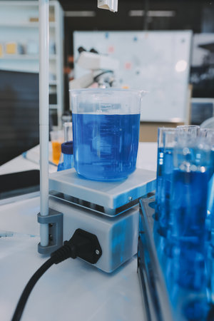 Collaboration, tablet or science with people in lab together for research or development. Innovation, tech and microscope with scientist team in clinical trial for planning or medical investigationの写真素材