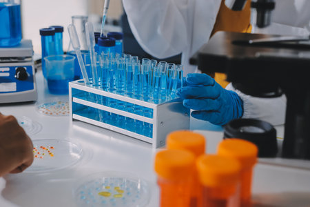Collaboration, tablet or science with people in lab together for research or development....