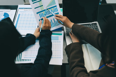 Success, audience with an applause and in a business meeting at work with a lens flare together. Achievement or celebration, motivation and businesspeople clapping hands for good news or supportの写真素材