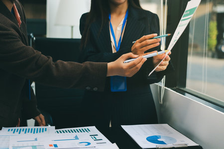 Success, audience with an applause and in a business meeting at work with a lens flare together. Achievement or celebration, motivation and businesspeople clapping hands for good news or supportの写真素材