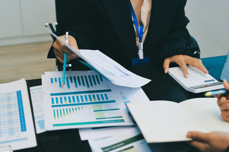 Success, audience with an applause and in a business meeting at work with a lens flare together. Achievement or celebration, motivation and businesspeople clapping hands for good news or supportの写真素材