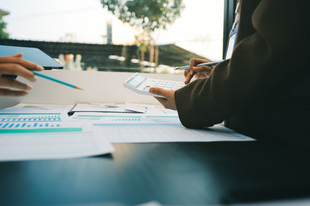 Success, audience with an applause and in a business meeting at work with a lens flare together. Achievement or celebration, motivation and businesspeople clapping hands for good news or supportの写真素材