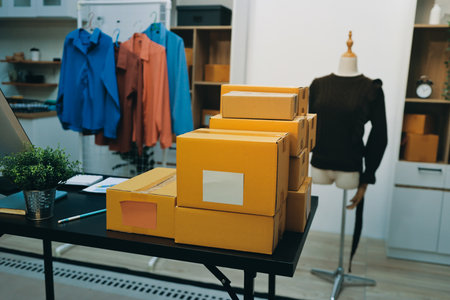 Portrait of Starting small businesses SME owners, two Asian woman check online orders Selling...