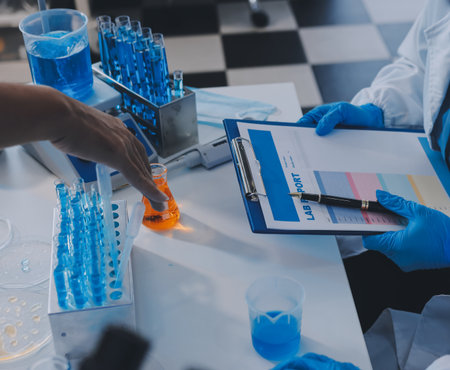 Collaboration, tablet or science with people in lab together for research or development....