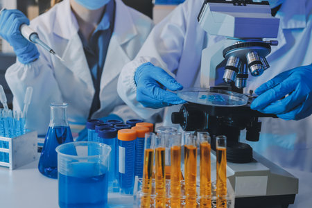 Collaboration, tablet or science with people in lab together for research or development....