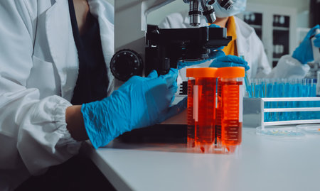 Collaboration, tablet or science with people in lab together for research or development....