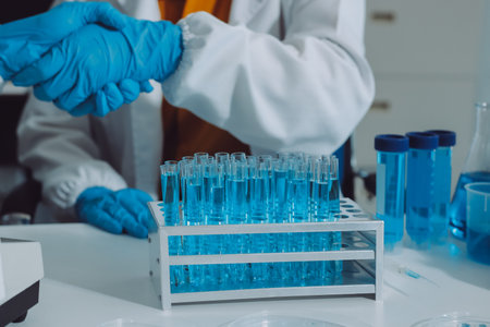 Collaboration, tablet or science with people in lab together for research or development....