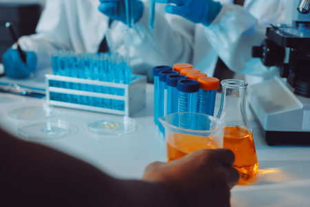 Collaboration, tablet or science with people in lab together for research or development....