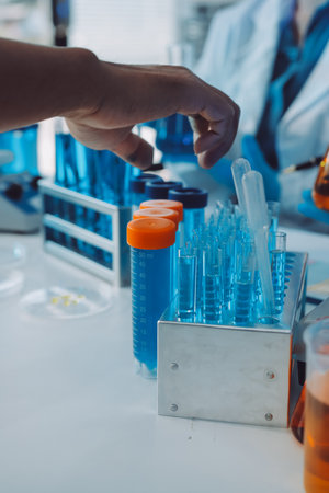 Collaboration, tablet or science with people in lab together for research or development....