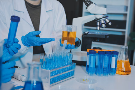 Collaboration, tablet or science with people in lab together for research or development....