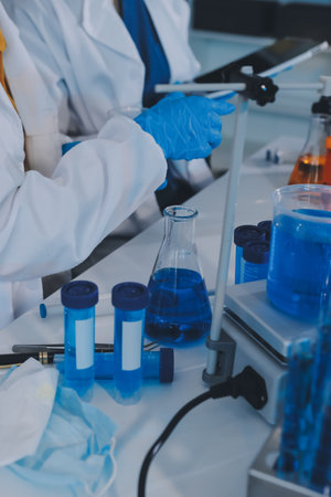 Collaboration, tablet or science with people in lab together for research or development....