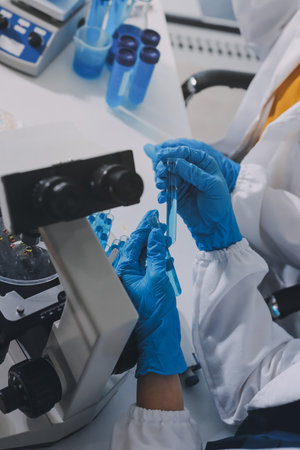 Collaboration, tablet or science with people in lab together for research or development....