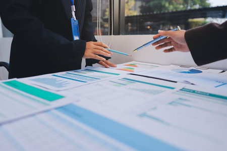 Success, audience with an applause and in a business meeting at work with a lens flare together. Achievement or celebration, motivation and businesspeople clapping hands for good news or supportの写真素材