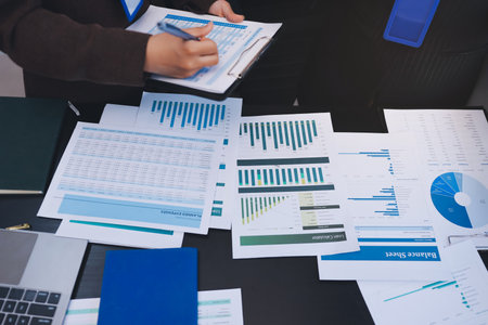 Success, in a business meeting at work with a lens flare together. Achievement or celebration, motivation and businesspeople clapping hands for good news or supportの写真素材