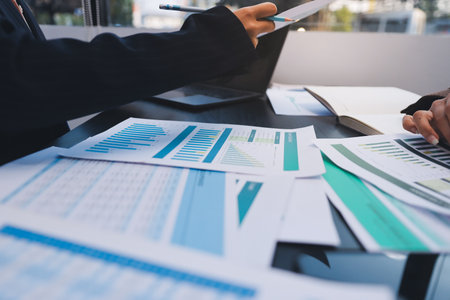 Success, audience with an applause and in a business meeting at work with a lens flare together. Achievement or celebration, motivation and businesspeople clapping hands for good news or supportの写真素材