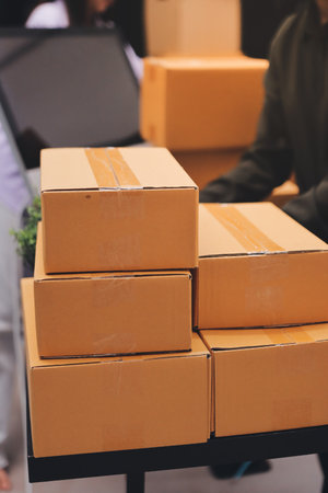 Portrait of Starting small businesses SME owners, two Asian woman check online orders Selling...