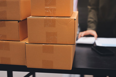 Portrait of Starting small businesses SME owners, two Asian woman check online orders Selling...