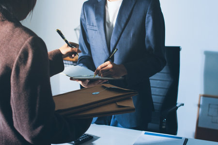 Lawyer explained to the client about the law that must be brought against the court case.