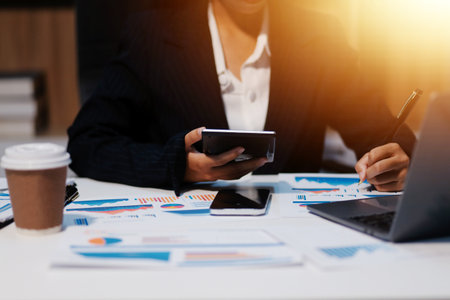 Audit concept,Administrator business man financial inspector and secretary making report calculating...