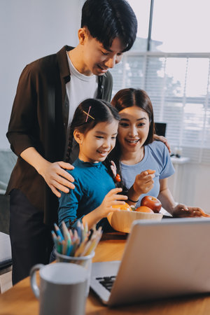 Family spends their free time togetherの写真素材