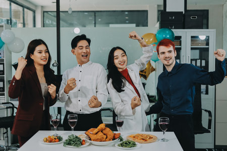 Diversity, dinner and group of people toast celebration together at party. Friends, happy and celebrate with food, wine and friendship for love, support and cheers champagne at business functionの写真素材